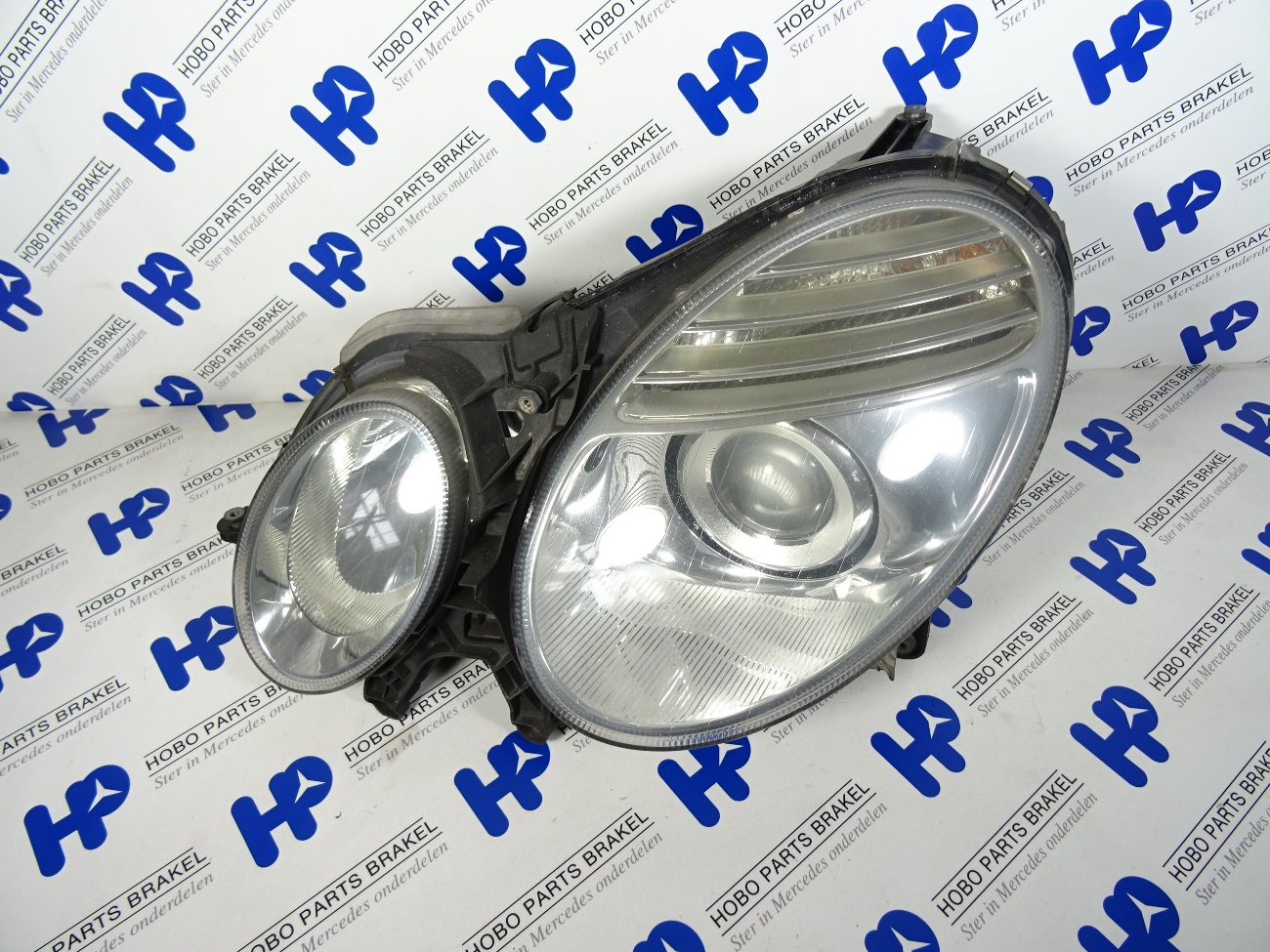 Koplamp E-klasse w211 Facelift Links