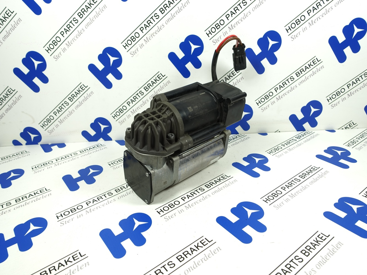 Luchtvering compressor A 099 320 0004